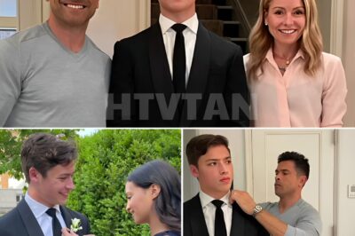 “EXCLUSIVE: KELLY RIPA AND MARK CONSUELOS’ SON, JOAQUIN, WEARS DAD’S SUIT AND ANNOUNCES HIS UPCOMING BIG DAY: ‘I’LL BE THE FIRST IN THE FAMILY TO GET MARRIED!’”  In a heartwarming and unexpected moment, Kelly Ripa and Mark Consuelos’ son, Joaquin, proudly donned his father’s suit and shared some exciting news: “I’ll be the first in the family to get married!” This touching announcement has left fans in awe as the family celebrates this new chapter in their lives. What’s next for Joaquin and his big day? Fans are eagerly waiting for more details on this joyous milestone. Full story below 👇