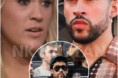 CARRIE UNDERWOOD VS. BAD BUNNY — HER PATRIOTIC OUTBURST IS SPARKING A CULTURE WAR ON STADIUM GROUND 🏟️💥 What started as a silent moment at a Yankees game has exploded into a national firestorm. When Bad Bunny stayed seated during “God Bless America,” some called it a protest, others called it disrespect. But when Carrie Underwood weighed in with a fierce rebuke, lines were drawn — and fans took sides. Was it freedom of expression or a slap to American tradition? Carrie’s words may have lit the match, but the fire isn’t going out anytime soon. 👇 What’s really behind this growing tension — and why it could reshape more than just sports and music.