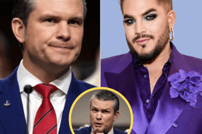 🚨 ADAM LAMBERT SUES FOR $50 MILLION After Hegseth’s Live Attack — “BEATEN BEATEN – PAY NOW!” 😱🔥 Nobody saw it coming. One minute, it was an interview — the next, Pete Hegseth went full scorched earth on Adam Lambert. But the pop icon didn’t stay silent. He’s suing. Big time. $50M. One lawsuit. Total war. The internet’s melting down — and fans are calling it “the most savage clapback of the year.” 👇 Full story + legal docs in the comments.